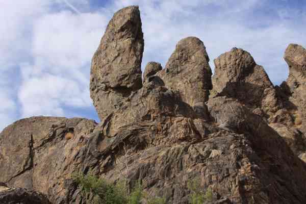 A photo of large rocks in the desert